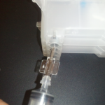 Five degree tilt on the syringe for priming.